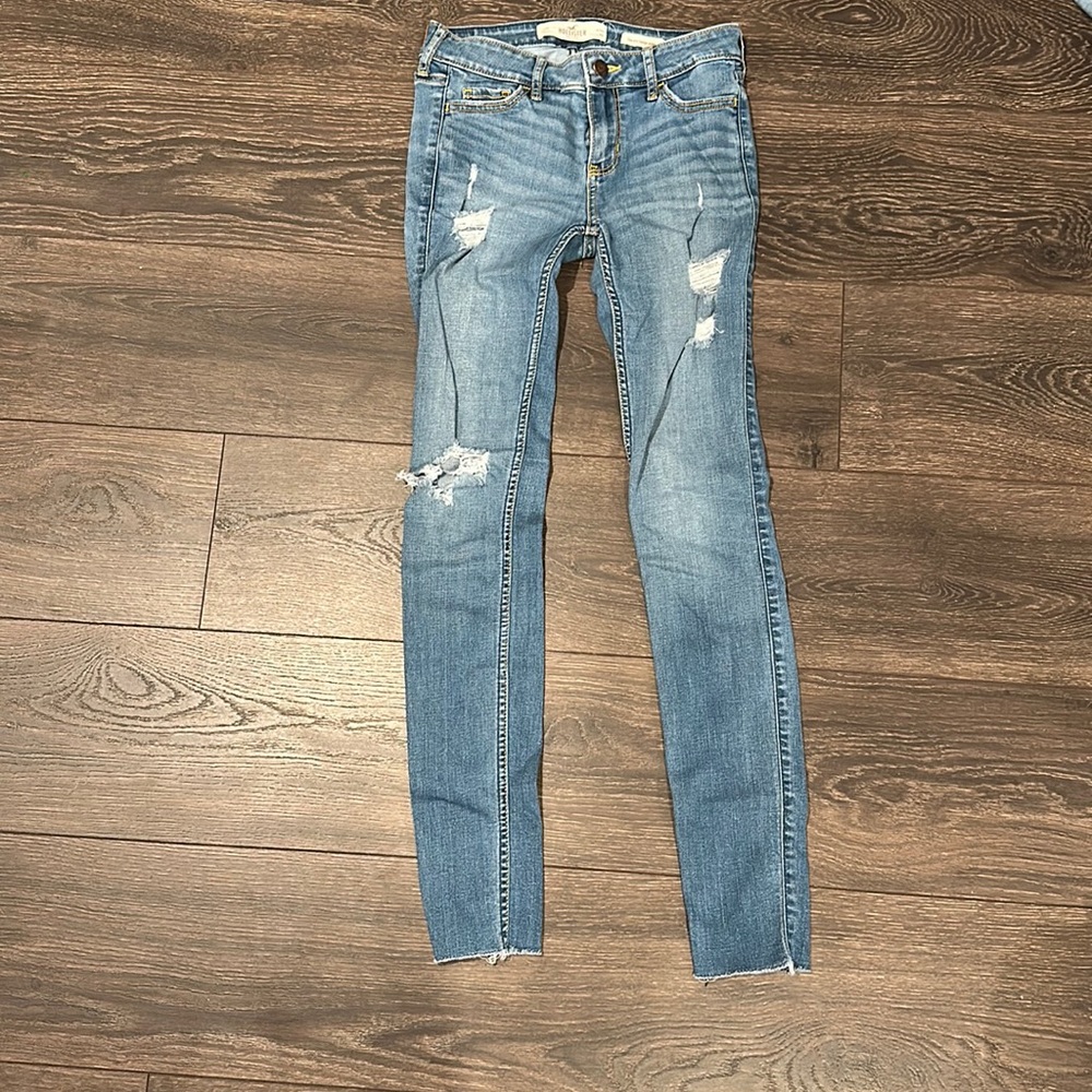 Hollister medium wash distressed low rise super skinny jeans size 0r